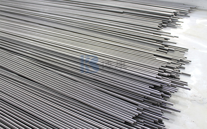 How does the multi-pass drawing process of titanium wire create a precise string in the medical and industrial fields?